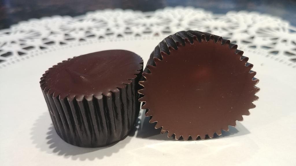 6 Peanut Butter Cups · Our handmade peanut butter cream surrounded by chocolate. 6 pieces, choose either milk or dark chocolate. Contains butter.
