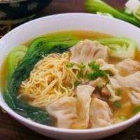 Wonton Noodle Soup · Seasend broth with filled wonton dumplings.