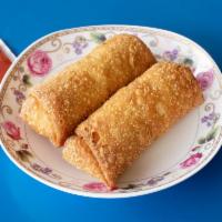 Egg Roll 肉蛋卷 · With vegetable and pork filling.