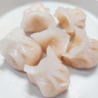 Crystal Shrimp Dumpling 水晶虾饺 · 8 pieces, with whole shrimp in each dumpling.