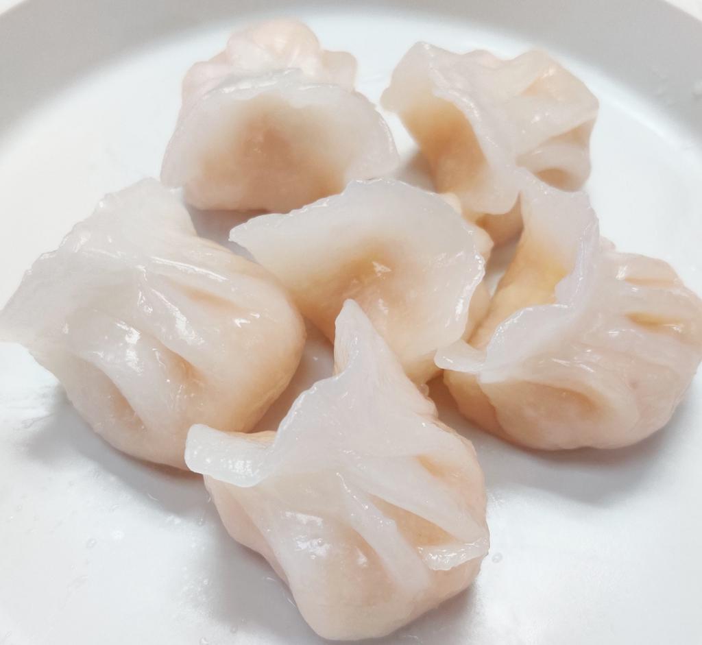 Crystal Shrimp Dumpling 水晶虾饺 · 8 pieces, with whole shrimp in each dumpling.