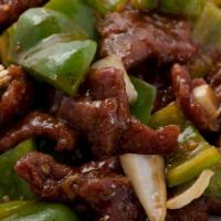 135. Pepper Steak with Onion 青椒牛 · Served with rice.
