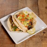 Presidente Taco · Grilled beef steak served with lettuce, jack cheese and chipotle salsa.