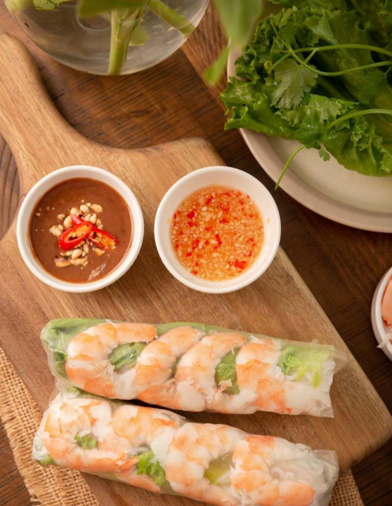 FRESH SHRIMP SPRING ROLLS (2pcs) · Rice paper wrappers/ Spring rolls filled with shrimp, vermicelli, mixed fresh herbs, cucumber and dip in your choice of dipping sauce.