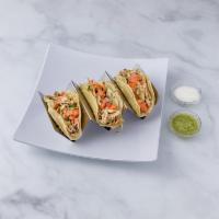 Tacos de Pollo · 3 soft corn tortillas with chicken, onion, cilantro, avocado, lettuce and tomatoes.