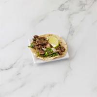 Steak Taco · Grilled outer-skirt beef marinated with our special dry rub. Gluten free.