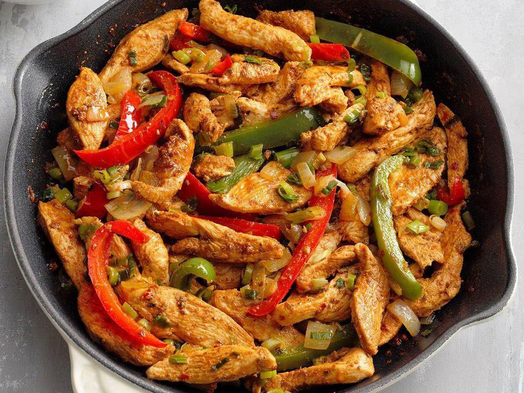 Fajitas · Grilled chicken, steak or shrimp with sautéed onions, tricolor peppers and tomato. Served with rice, beans, sour cream and tortillas 