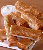 Cinnamon Sticks · Sprinkled with cinnamon and sugar and served with icing dipping sauce.
