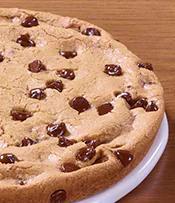 Ultimate Chocolate Chip Cookie · Pizza night just got a whole lot sweeter. Freshly baked and warm from the oven, our cookie is packed with semi-sweet chocolate chips that melt in your mouth.