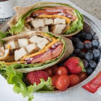 Grilled Chicken Wrap · Romaine Lettuce, Tomato , Avocado, American Cheese and Chipotle mayo.