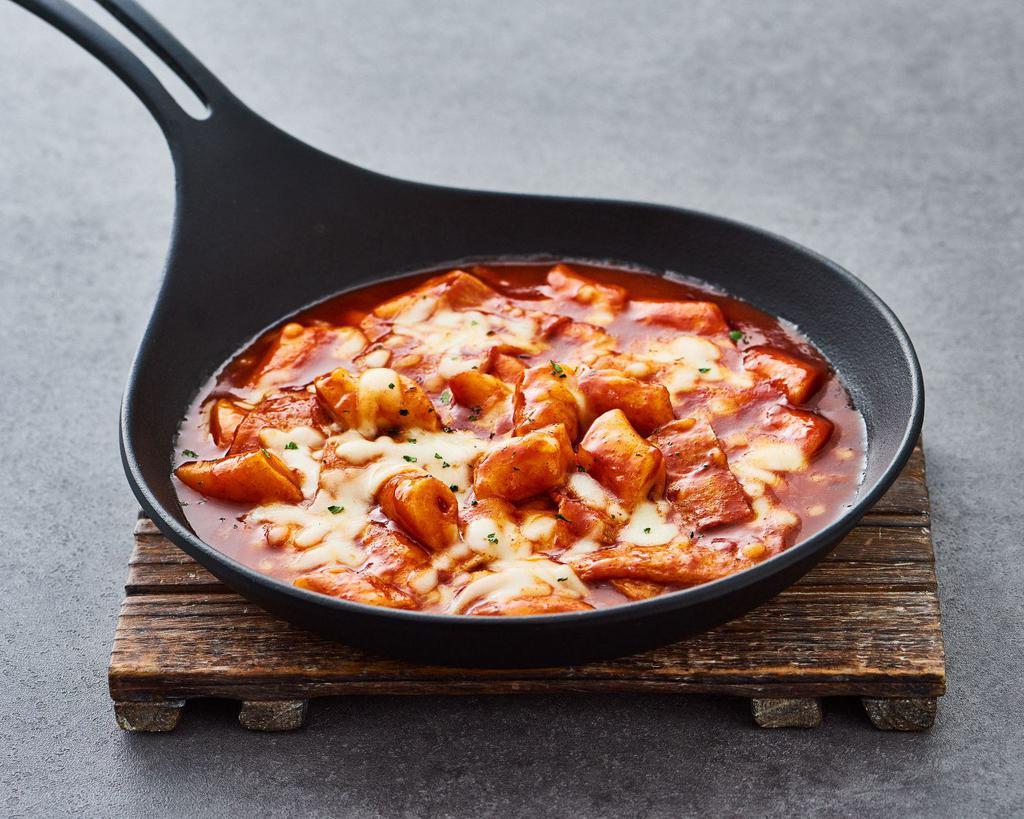 Tteok-bokki with Cheese · Spicy rice cake with fish cake;
Perfect dipping sauce for our original fried chicken

*FOOD ALLERGY NOTICE*
Please be advised that food prepared here may contain these ingredients.
Milk, Eggs, Wheat, Soybean, Peanuts, Garlic, Corn.


