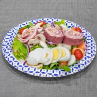 4. Chef's Salad  · Slice roast turkey, boiled ham, roast beef, Swiss, and American cheese, sliced eggs, tomatoe...