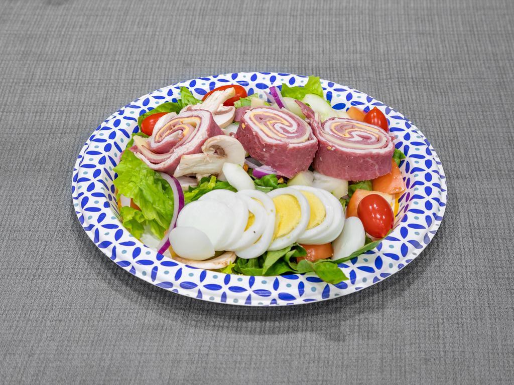 4. Chef's Salad  · Slice roast turkey, boiled ham, roast beef, Swiss, and American cheese, sliced eggs, tomatoes on a bed of crispy lettuce. 