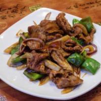 52. Beef Pepper Steak with Onions · 