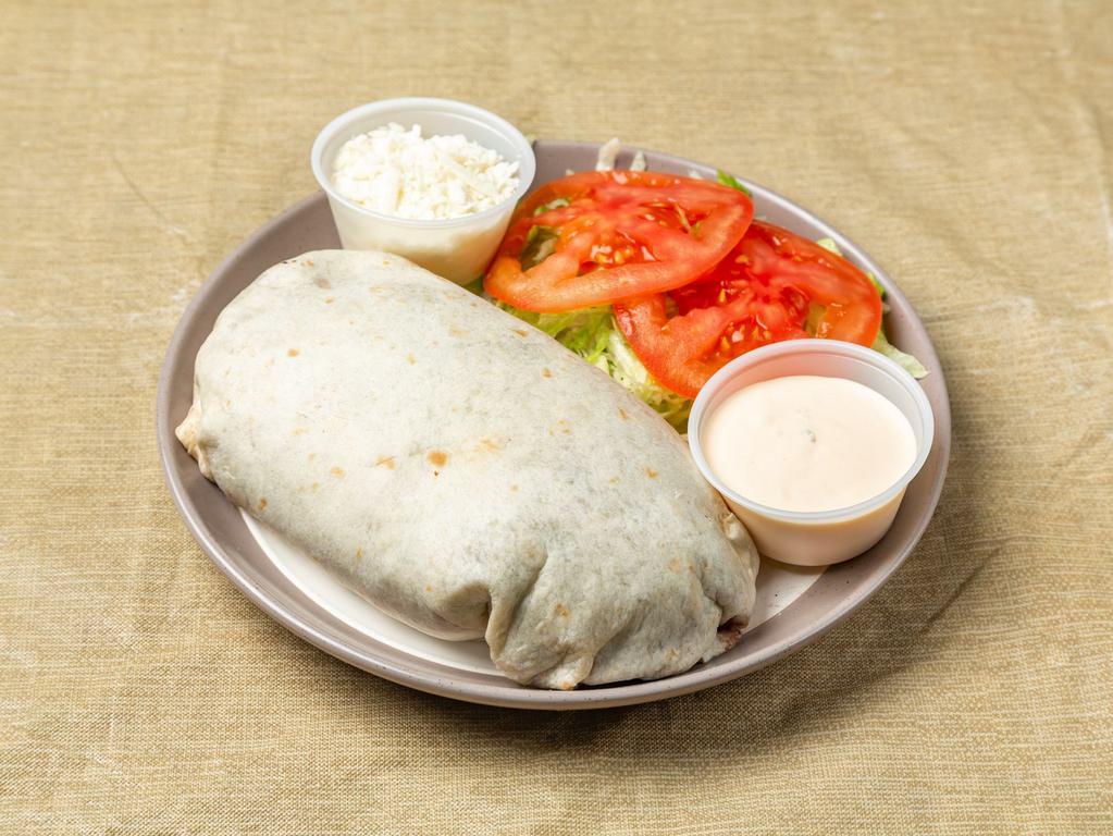 Burrito · Rice and beans with your choice of beef, or chicken with a side of lettuce and tomato.  