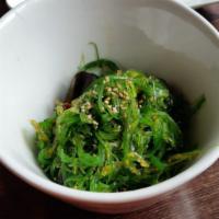 Seaweed Salad · Wakame seaweed with seasame seeds.