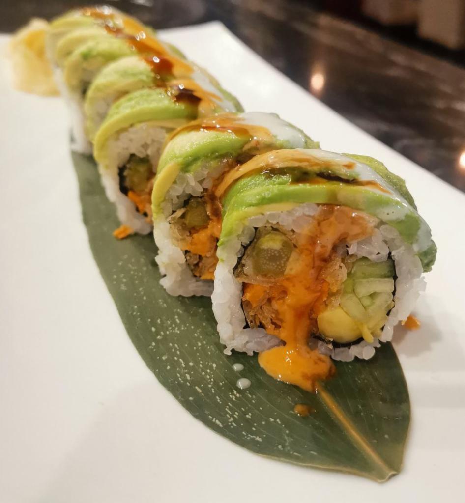 Green Peace · Sweet potato tempura, asparagus, cucumber, mango, topped with sliced avocado and sauce on the side