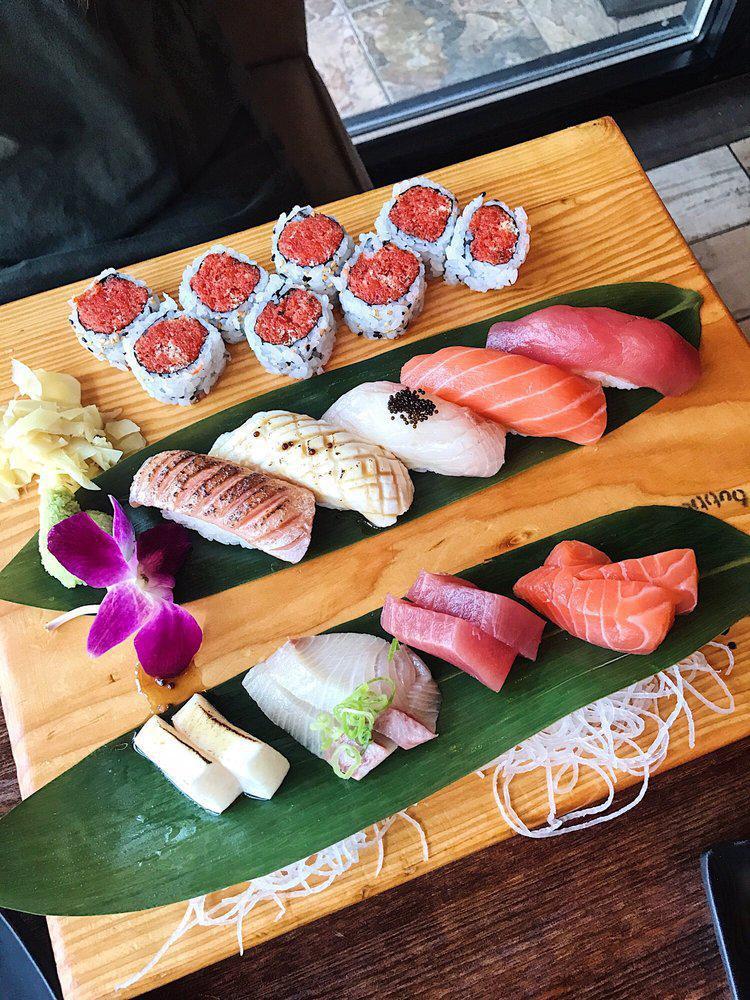 Sushi and Sashimi Platter For 1 · 8 Pieces Sashimi, 5 Pieces nigiri and a spicy tuna roll.