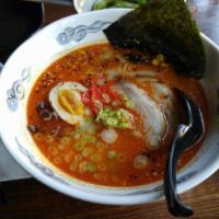 Spicy Miso Ramen · Noodles with chasu pork, corn, red pickled ginger, mushroom ears, scallion and marinated egg...