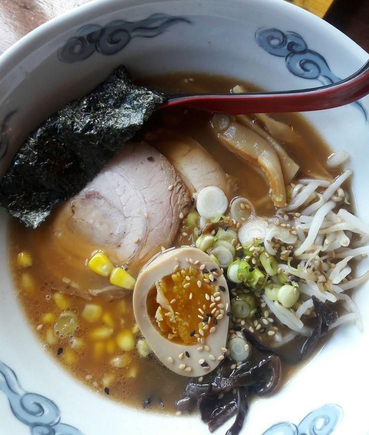 Shoyu Ramen · Noodles with chasu pork, corn, bamboo shoots, mushroom ears, scallion and marinated egg. Pork broth merged with soy flavored soup on the side.