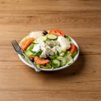 Greek Salad · Chuncks of premium feta over mixed greens, tomato, cucumber, pepper, egg and Kalamata olives.