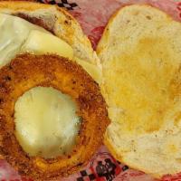 Royal Filet Mignon · With American cheese, crowned with two homemade onion rings