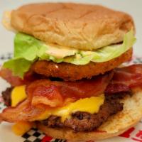 Double Texas Ringer Burger · Our #1 Selling Burger! Topped with cheese, bacon, onion rings, lettuce, and Texas petal sauce 