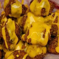 15 Cheese Nuggets · Fresh, all-white meat chicken, hand-breaded on-premises topped with whiz

