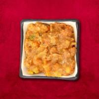 Samosa Dynesty · Triangular shaped flaky pastry smashed and loaded with curd, chickpeas, onions, sev, and chu...