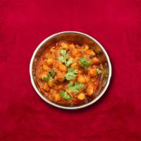 Chickpea Fusion · Chickpea cooked after getting boiled with onion, garlic, ginger, and tomato paste with spices.