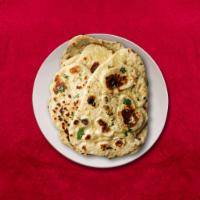 Go Garlic Naan · Fluffy dough properly smashed and stuffed with garlic, baked in an Indian tandoor oven