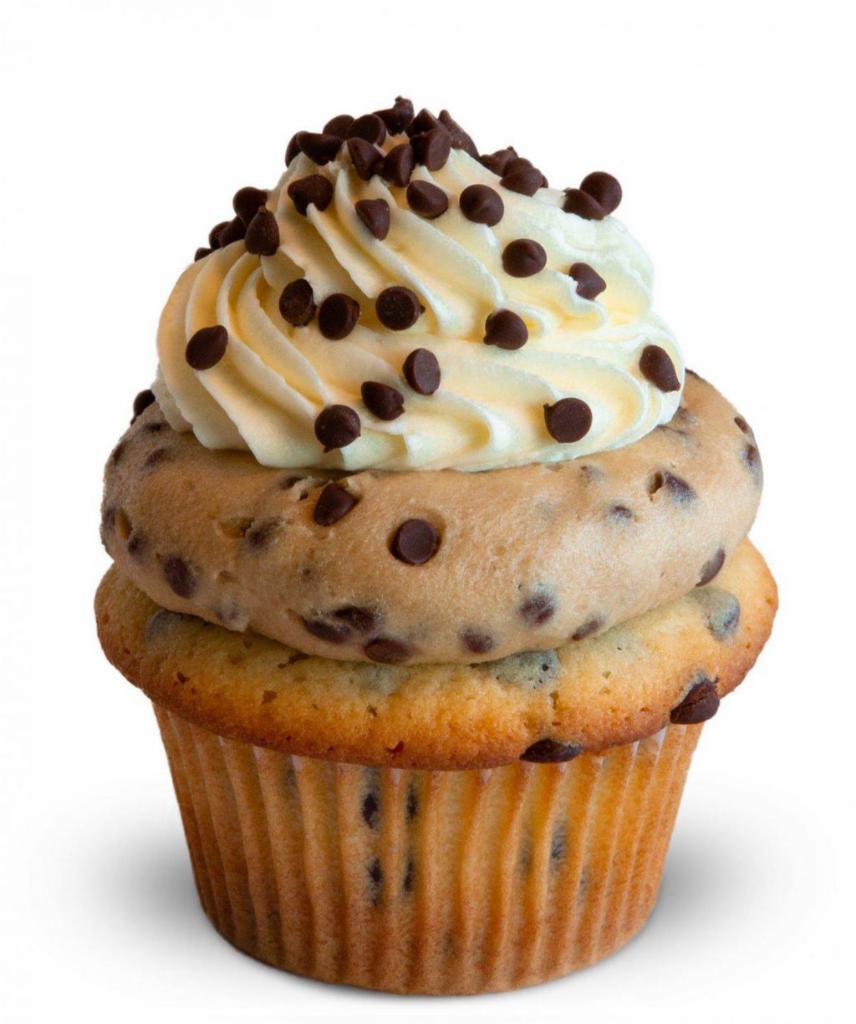 Chocolate Chip Cookie Dough Cupcake · Chocolate chips, brown sugar, vanilla. Love eating cookie dough by the spoonful? Then our new chocolate chip cookie dough cupcake is a must-try! For this decadent flavor we fold mini chocolate chips into our Madagascar vanilla cake then top it with a swirl of our house-made (and egg free!) cookie dough, then add a swirl of vanilla butter cream and more mini chocolate chips on top.