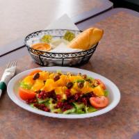 Orange Salad · Romaine lettuce, oranges, cranberries, tomatoes, walnut, Kalamata olives.