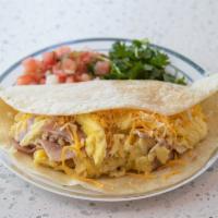 Ham, Egg & Cheese · Smoked hardwood ham with scrambled eggs, and shredded Monterrey and cheddar jack cheese in a...