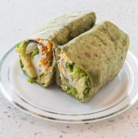 Turkey Bacon Wrap · Sliced turkey breast, center-cut bacon with leafy greens all wrapped up in a spinach flour t...