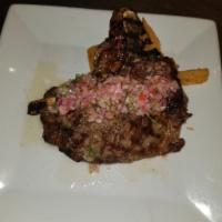 T-Bone steak · A cut of beef from the loin grilled  seasoned 