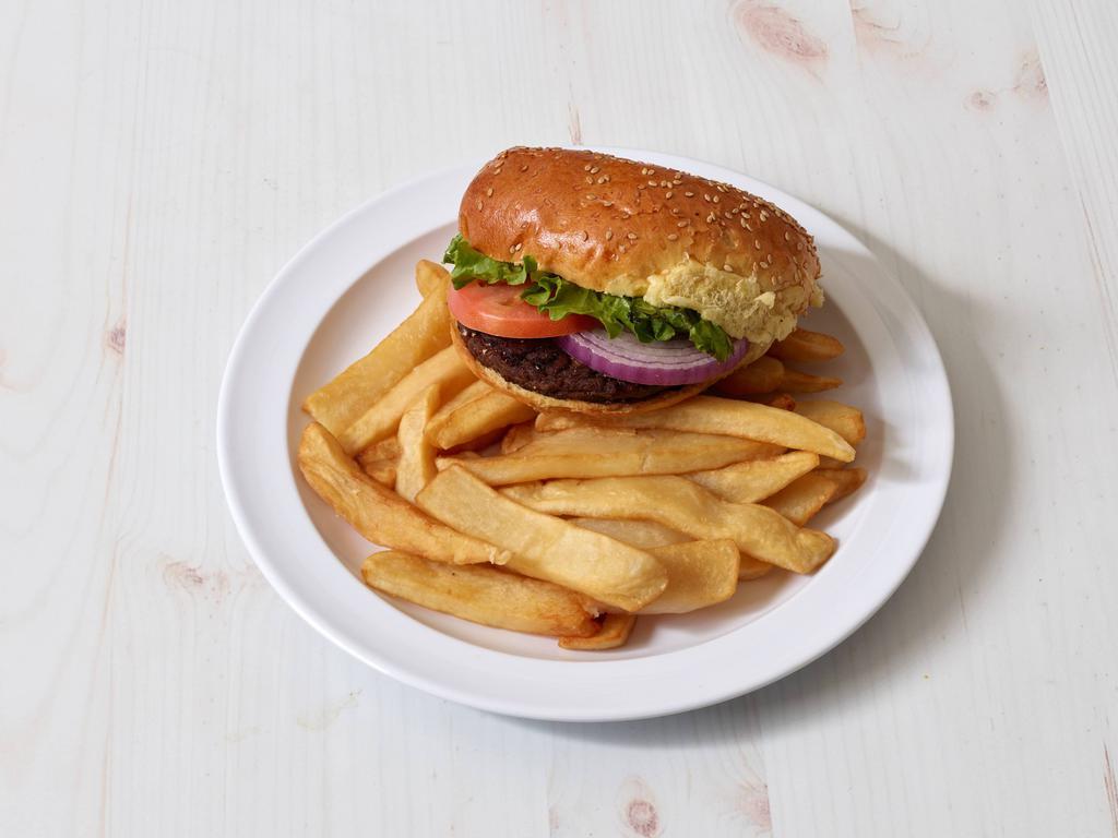 Burger Deluxe · Served with our steak fries, lettuce, tomato, sliced red onion and kosher dill pickle.