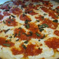 Margherita Pizza · Fresh mozzarella, tomato sauce, basil.