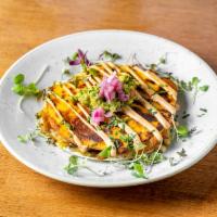 Grilled Chicken Quesadilla · cheese, poblano peppers, caramelized onions, chipotle aioli 