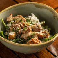 Baby Kale Caesar · Garlic croutons and Parmesan. Add grilled chicken, hanger steak for an additional charge.