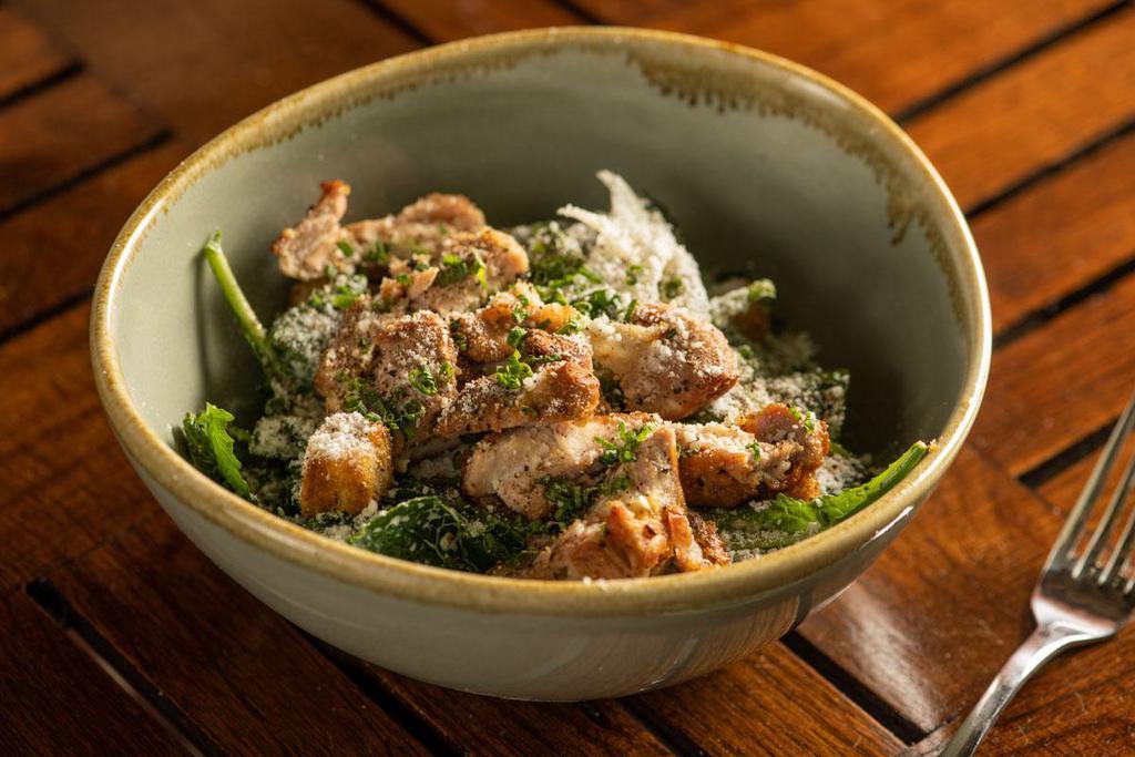 Baby Kale Caesar · Garlic croutons and Parmesan. Add grilled chicken, hanger steak for an additional charge.