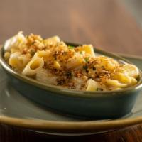 Truffle Mac and Cheese · three-cheese blends, toasted breadcrumbs 