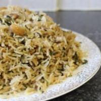 Baghara Rice · Basmati rice cooked in onions, green chilies, ginger, garlic, cilantro, mint and exotic spic...