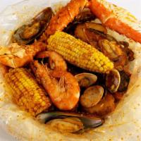 Seafood Combo 9 · 1/2 lb. king crab legs, 1/2 lb. shrimp (head-on), 1/2 lb. clams, and 1/2 lb. green mussels. ...