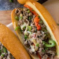 NYC's Only Authentic  Cheesesteak · This Delicious Thinly sliced chuck roast shavings are marinated before they get browned and ...