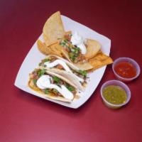 Beef Tacos · 4 pieces. Served with chips and salsa.