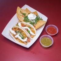 Shrimp Tacos · 3 pieces. Served with chips and salsa.