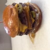 Premo Pounder Burger · Three 1/3rd pound premo patties, for a total of ONE POUND burger on our Brioche Bun. topped ...