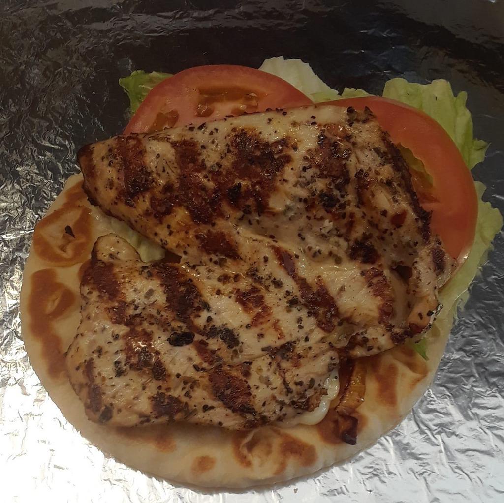 Char Chicken Sandwich · House marinated chicken breast,  char grilled served on choice of pita, French bread or brioche bun. With lettuce, tomato & mayo.