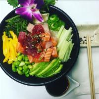 Poke Rainbow Bowl · Tuna, salmon, yellowtail, seaweed salad, edamame, mango, cucumber, furekaki, green onion, av...